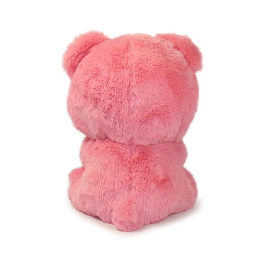 Pink teddy bear backside on a white background