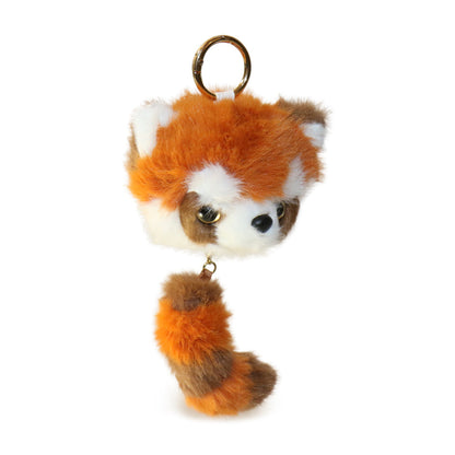 Plush fox keychain on a white background