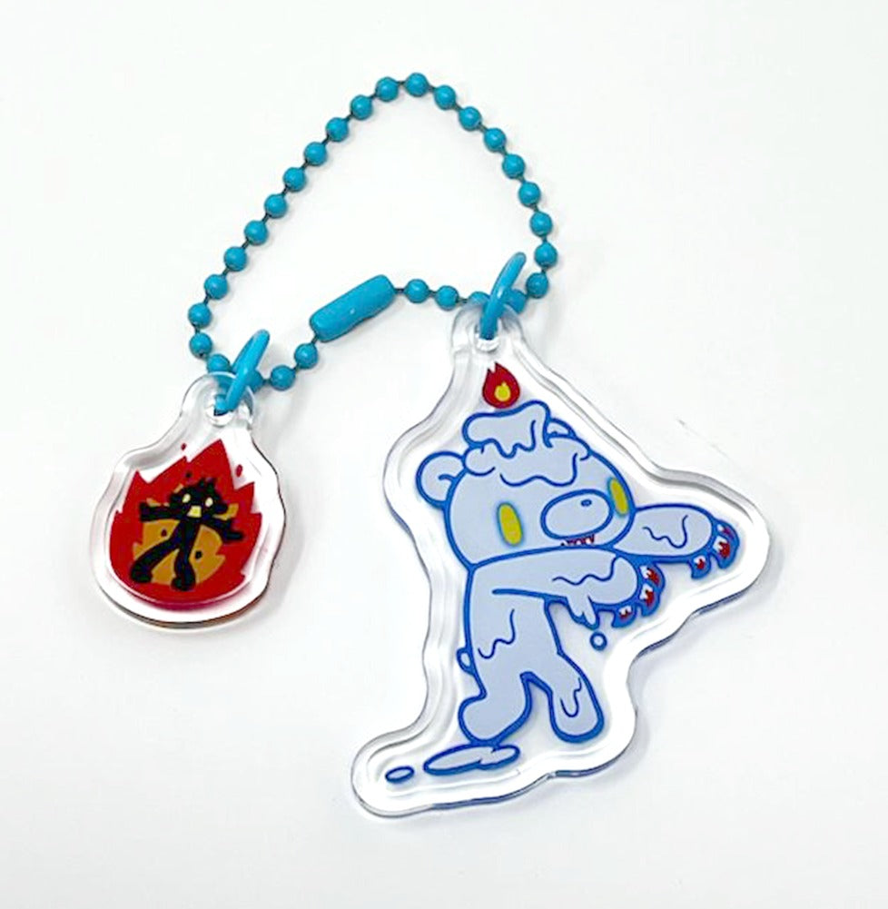 Keychain with cartoon bear design and colorful elements on a white background