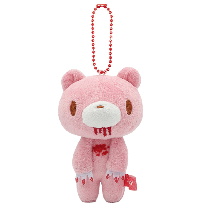 Pink plush toy with a keychain on a white background