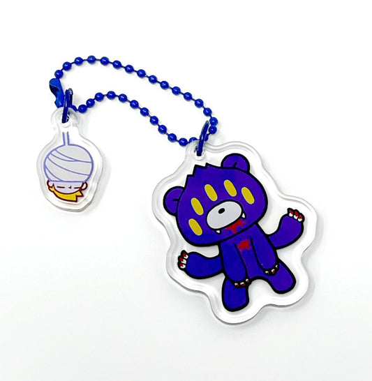 Keychain with a blue cartoon bear character on a white background